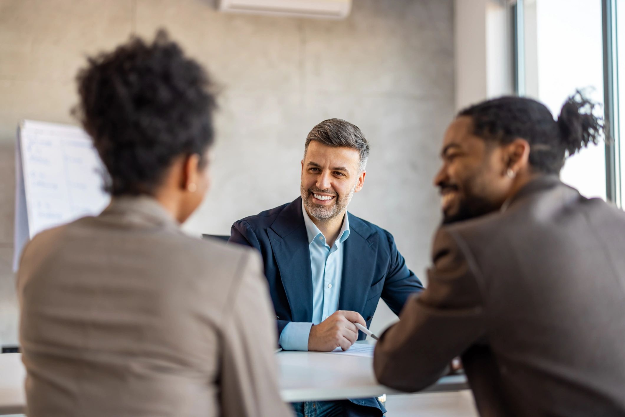 Advisor reviewing documents with clients