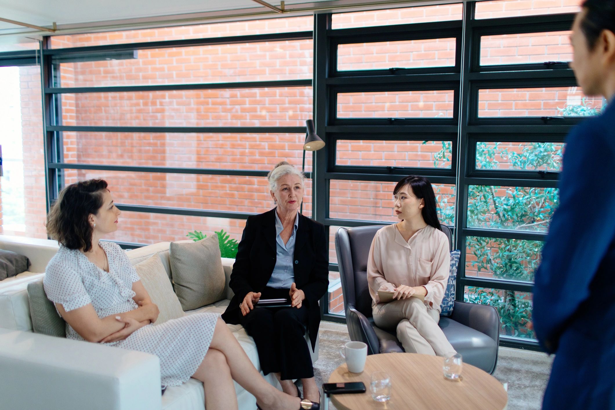 Client and advisor meeting in a private lounge